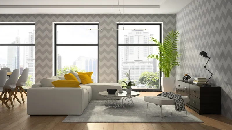 modern living interior with patterned wallpaper and accents of yellow